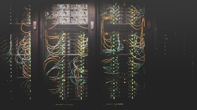 Sleek glowing datacenter server racks representing Cloud Systems